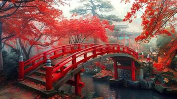 Red Bridge in a Misty Autumn Garden photo