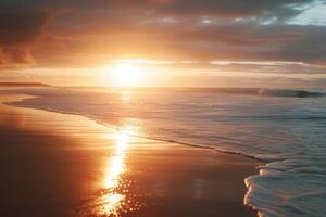 Golden sunset reflecting on tranquil beach waves photo