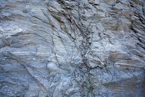 Close-up sharp cliff rock texture background image photo