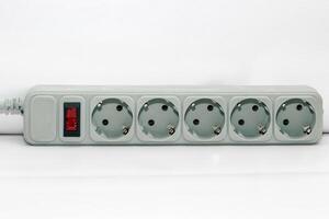 Carry extension cord with sockets. Wire for convenience in everyday life. photo