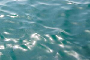 water surface of the sea. turquoise texture. photo