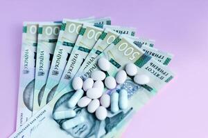 Pills and vitamins on a protective medical bandage. Influenza virus. photo
