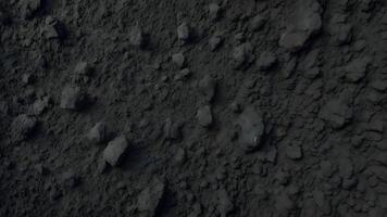 Dark Gray Volcanic Ash Texture with Gritty Surface photo