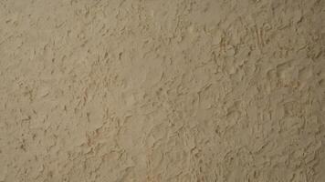 Light Beige Textured Stucco Wall photo