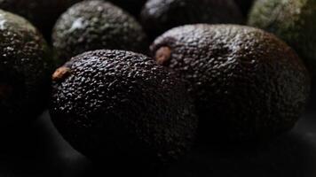 Avocado fruit, closeup of avocados fruit with drops video