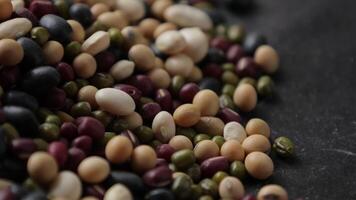 Closeup of bean on black table background video