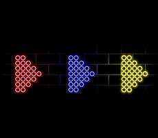 Glowing neon arrow pointer in gold color on a dark brick wall background. vector