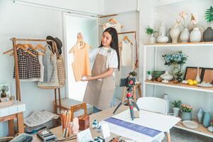 Small business owners are live streaming. Sell products to customers who come to see to buy and take orders. Check out the orders that customers order from online retailers - online shopping. photo