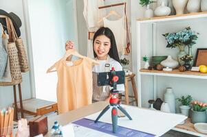 Small business owners are live streaming. Sell products to customers who come to see to buy and take orders. Check out the orders that customers order from online retailers - online shopping. photo