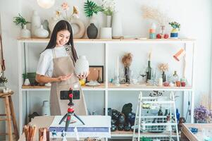 Small business owners are live streaming. Sell products to customers who come to see to buy and take orders. Check out the orders that customers order from online retailers - online shopping. photo