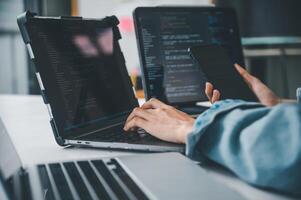 Female programmer working on coding, software development and web design.Concept technology development. photo