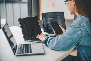 Female programmer working on coding, software development and web design.Concept technology development. photo