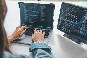 Female programmer working on coding, software development and web design.Concept technology development. photo