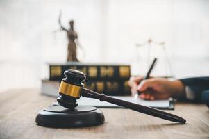 Law theme, mallet of the judge, law enforcement officers, evidence-based cases and documents taken into account. photo