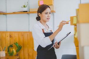 Small business owners online are checking their orders. where customers place orders and check the orders that the customers have ordered of online retailers - online shopping photo