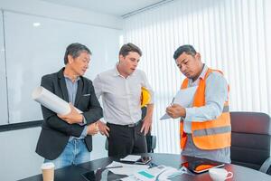 Business people team work while working in board room, design project, discussing ideas,discuss financial statistics together teamwork concept photo