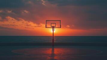 basketball hoop against the sunset. photo