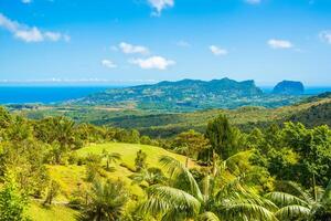 Aerial view of Mauritius island with mountains and beautiful blue lagoon photo