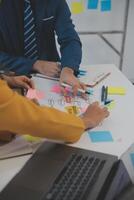 Meeting of business executives discussing analysis of the company's financial situation and business planning with partner collaboration and consultation of strategy. photo