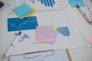 businessman working data document graph chart report marketing research development planning management strategy analysis financial accounting. Business office concept. photo