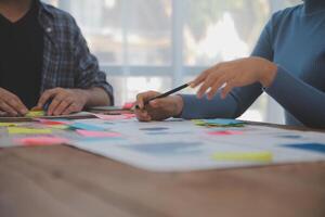 Team of business people working together in the meeting room office, teamwork background charts and graphs banner, double exposure successful teamwork,business planning concept. photo