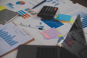 businessman working data document graph chart report marketing research development planning management strategy analysis financial accounting. Business office concept. photo