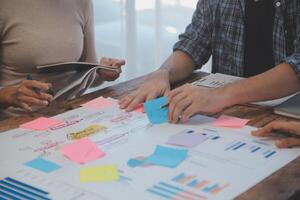 Team of business people working together in the meeting room office, teamwork background charts and graphs banner, double exposure successful teamwork,business planning concept. photo