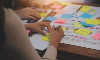 Team of business people working together in the meeting room office, teamwork background charts and graphs banner, double exposure successful teamwork,business planning concept. photo