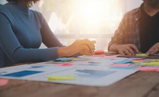 Team of business people working together in the meeting room office, teamwork background charts and graphs banner, double exposure successful teamwork,business planning concept. photo