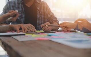 Team of business people working together in the meeting room office, teamwork background charts and graphs banner, double exposure successful teamwork,business planning concept. photo