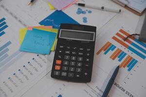 businessman working data document graph chart report marketing research development planning management strategy analysis financial accounting. Business office concept. photo