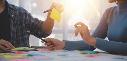 Team of business people working together in the meeting room office, teamwork background charts and graphs banner, double exposure successful teamwork,business planning concept. photo