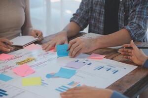 Team of business people working together in the meeting room office, teamwork background charts and graphs banner, double exposure successful teamwork,business planning concept. photo