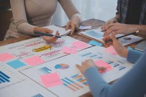 Team of business people working together in the meeting room office, teamwork background charts and graphs banner, double exposure successful teamwork,business planning concept. photo