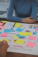 Team of business people working together in the meeting room office, teamwork background charts and graphs banner, double exposure successful teamwork,business planning concept. photo