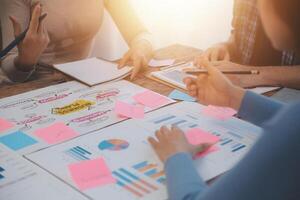 Team of business people working together in the meeting room office, teamwork background charts and graphs banner, double exposure successful teamwork,business planning concept. photo