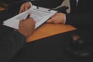 Law theme, gavel or mallet of the judge, lawyer enforcement officers, evidence-based cases taken into account in the court abount business, legislation. photo