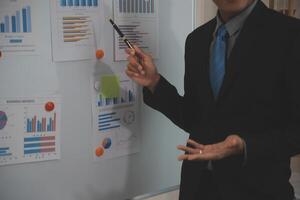 Audit concept,Administrator business man financial inspector and secretary making report calculating balance. Internal Revenue Service checking document. photo