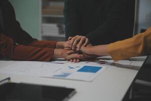Hand join together for work togetherness, Hand stack for business and service, Team volunteering or teamwork. Concept connection of community and charity. Group of business workforce participation. photo