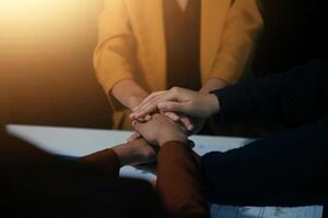 Hand join together for work togetherness, Hand stack for business and service, Team volunteering or teamwork. Concept connection of community and charity. Group of business workforce participation. photo