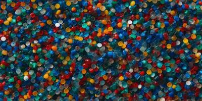 New material from recycled crushed plastic. photo
