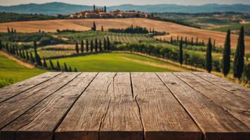 Empty wooden table for montage and display your products on the background of Tuscany landscape. photo
