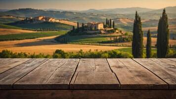 Empty wooden table for montage and display your products on the background of Tuscany landscape. photo