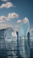 Icebergs floating in crystal clear water. photo