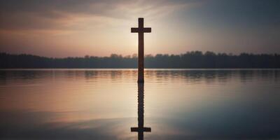 Serene Reflection of Cross on Peaceful Lake with Atmospheric Lighting. photo