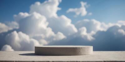 Grey round concrete stone podium for item showcase above fluffy clouds under a bright blue sky. photo