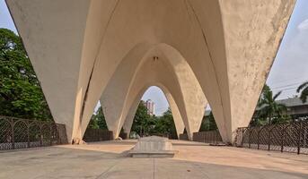 Shell structure of Mausoleum of three leaders at Shahbag Dhaka University area photo