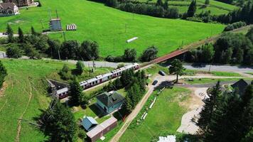 Aerial view of train and tunnel in Telgart in Slovakia in August 2024 video