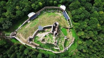 Aerial descending top down view of castle Zborov in Slovakia in August 2024 video
