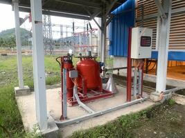 Fire Suppression System in an Industrial Setting. Automatic Fire Extinguishing System Gas Cylinders with Compressed Air. photo